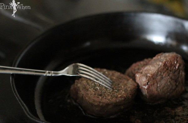 Filets seasoned and cooking in skillet