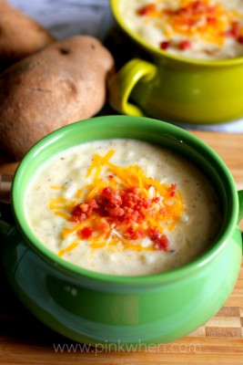 Slow Cooker Potato Soup in bowls with cheese and bacon toppings. 