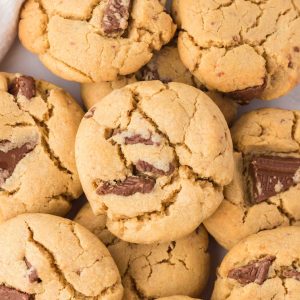Golden baked peanut butter cookies with chocolate chunks baked in them