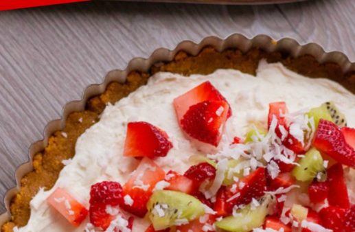 Fruit Pizza on cutting board.