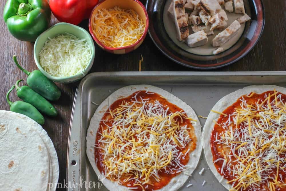 Fajita Chicken Mexican Pizza is one of my FAVORITE tailgating recipes. You can also easily change this up for so many variations. 