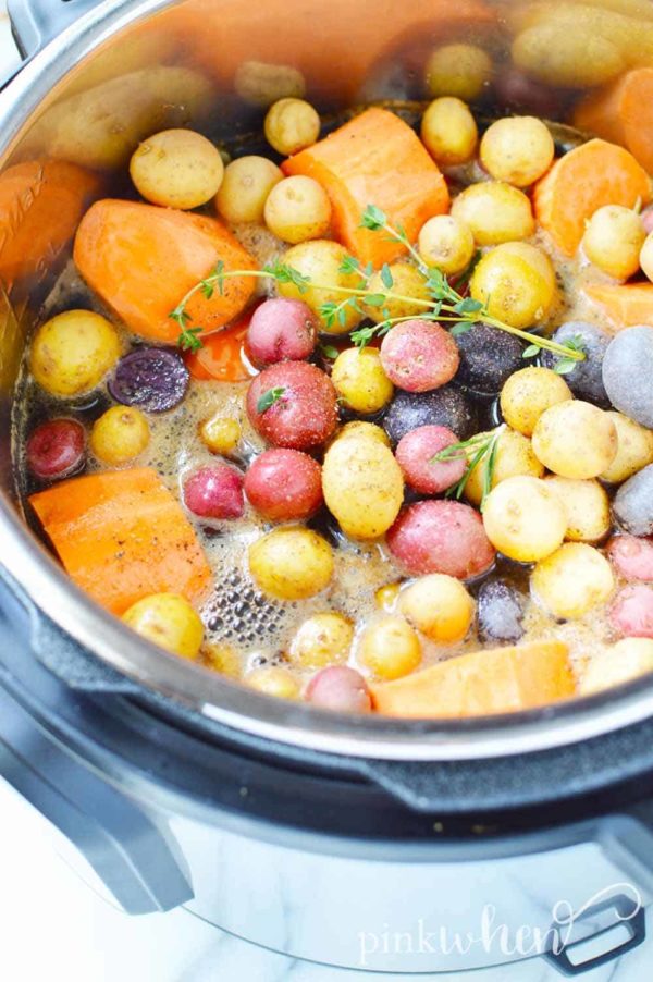This 30 minute Instant Pot Lamb Stew is made with a variety of vegetables and seasonings and it's chock full of flavors. Add this Pressure Cooker Lamb Stew recipe to your list of quick and easy Instant Pot Recipes! #InstantPot #EasyDinner #30minutemeal