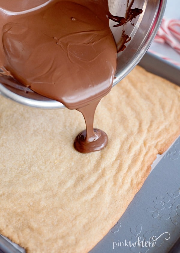 melted chocolate over sugar cookie crust