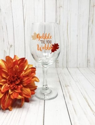 Fall themed wine glass with fall flowers