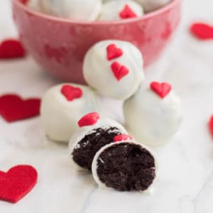 OREO Truffles in a dish with scattered red hearts.