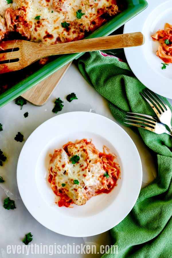 Chicken Parmesan Casserole scooped onto a plate and ready to serve. 