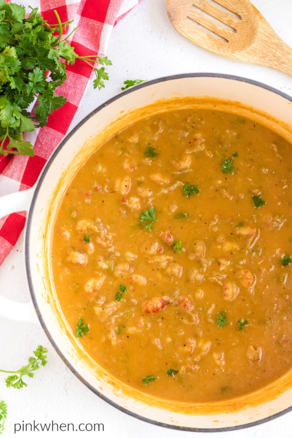 Crawfish etouffee made in a large pot and ready to scoop and serve. 