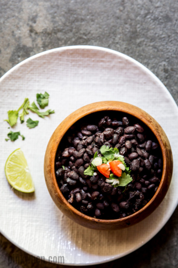 Black beans from the Instant Pot in a bowl and ready to eat.