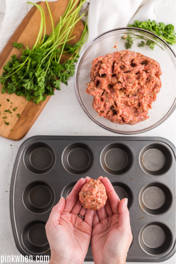 Making Italian meatballs to go into a muffin tin.