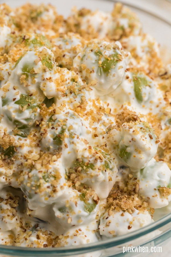 creamy grape salad with crumble graham cracker and pecan topping. 