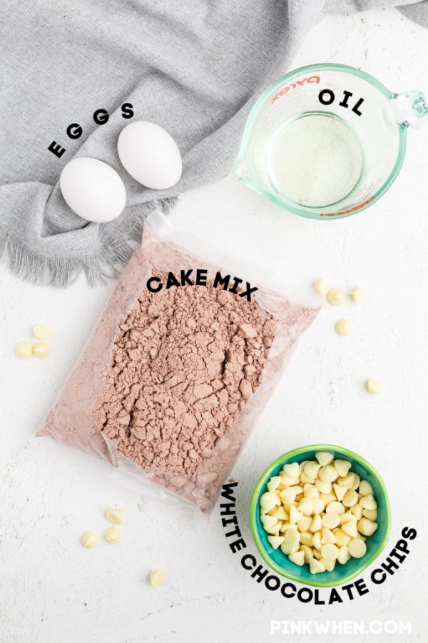 Ingredients spread out over a white table to make cake mix cookies. 