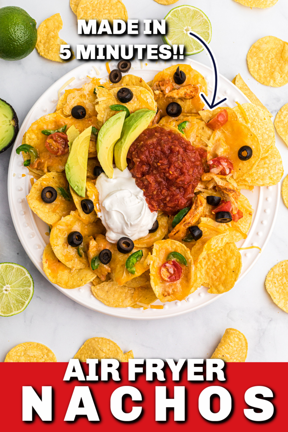 Air Fryer Nachos are loaded with cheese and chicken and done in just 5 minutes! Made with nacho round chips, fajita chicken meat, shredded cheese, sliced jalapenos, and more. You'll love how quick and easy this easy air fryer recipe can be, and your guests will devour it.