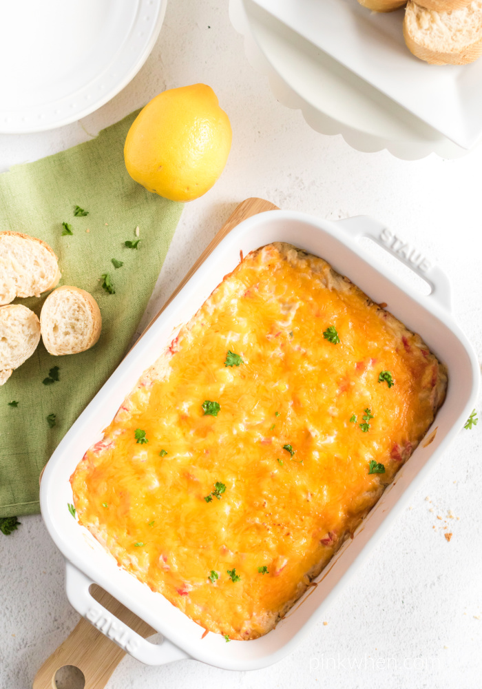 Cheesy Hot Crab Dip in a casserole dish ready to serve. 