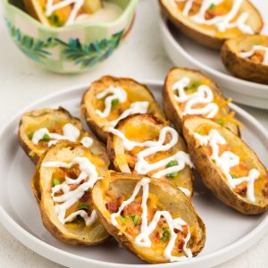 Loaded air fryer potato skins ready to eat.