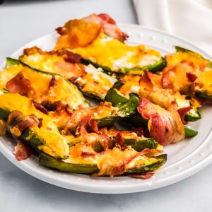 Cooked Jalapeno Poppers on a white plate ready to eat