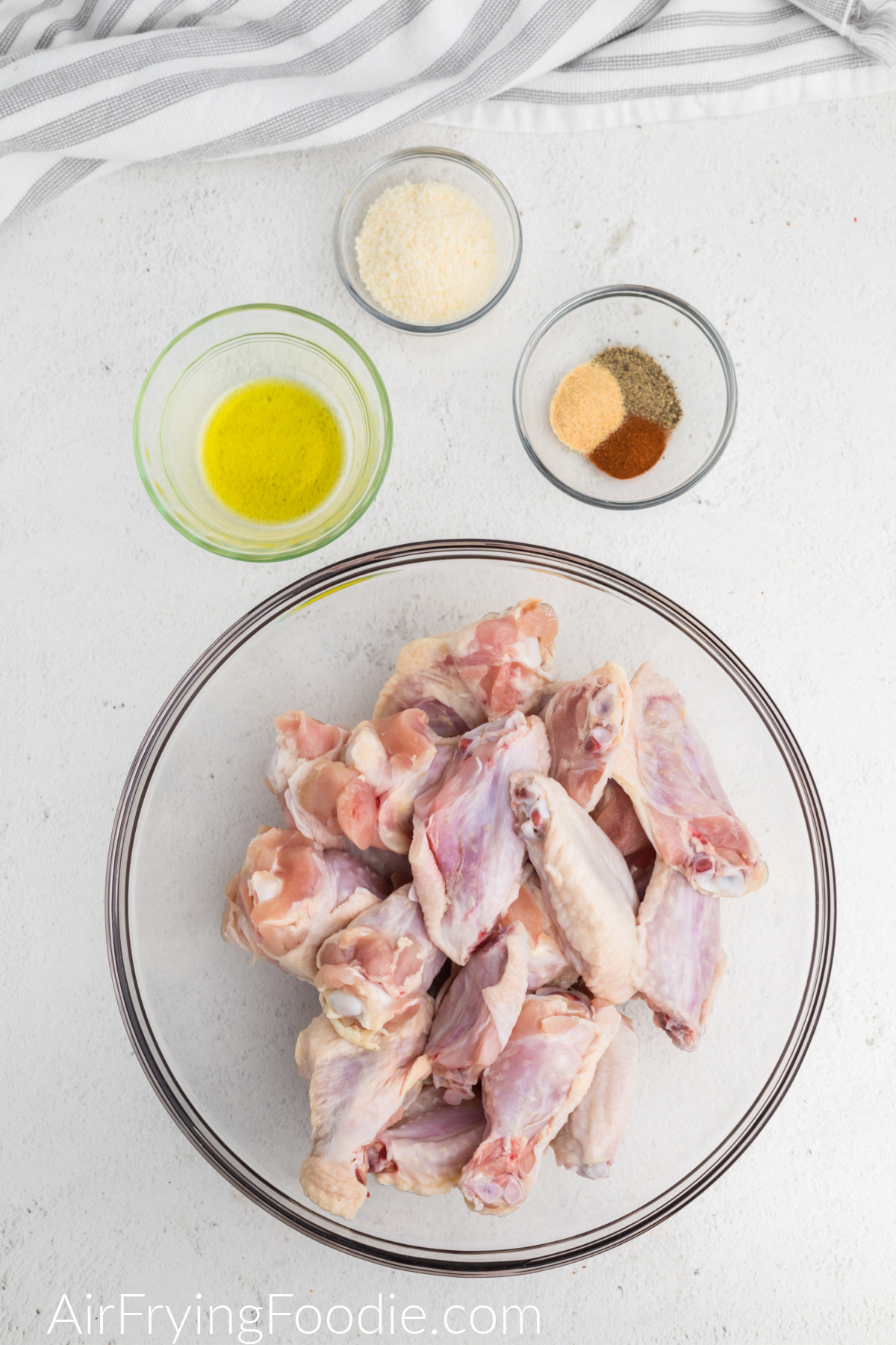 Ingredients needed to make garlic parmesan chicken wings in the air fryer. 