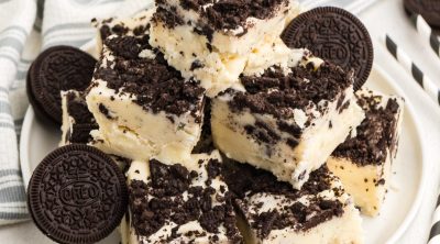 Stacked OREO Cookie Fudge on a white plate