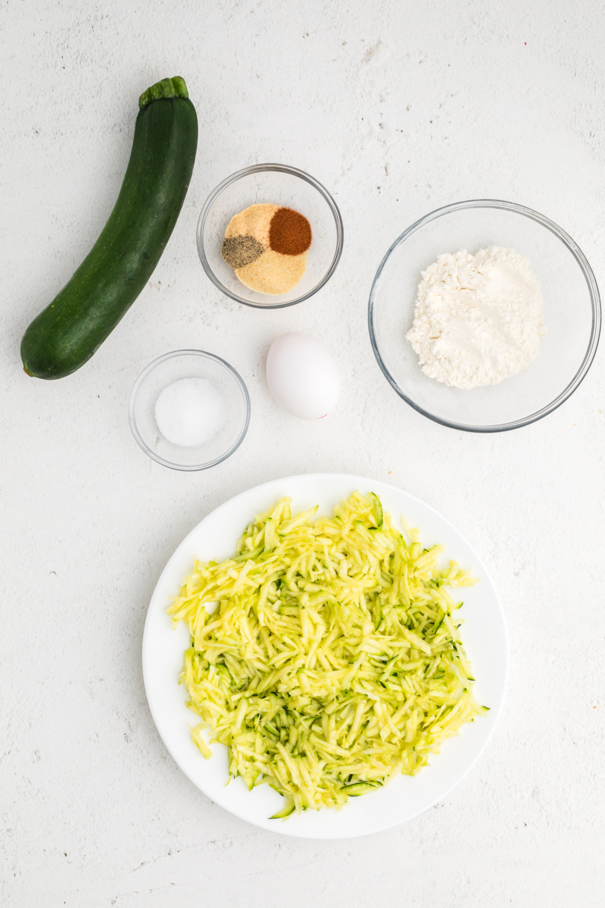 Ingredients needed to make zucchini fritters in the air fryer. 