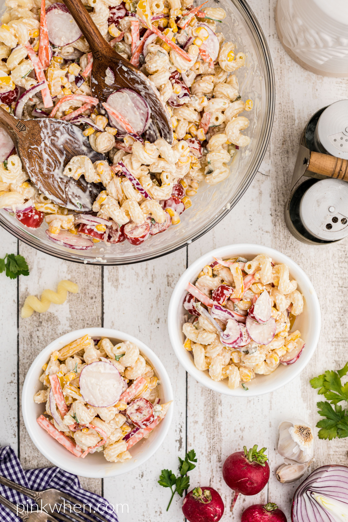 Summer Pasta salad in bowls on a table, ready to serve.