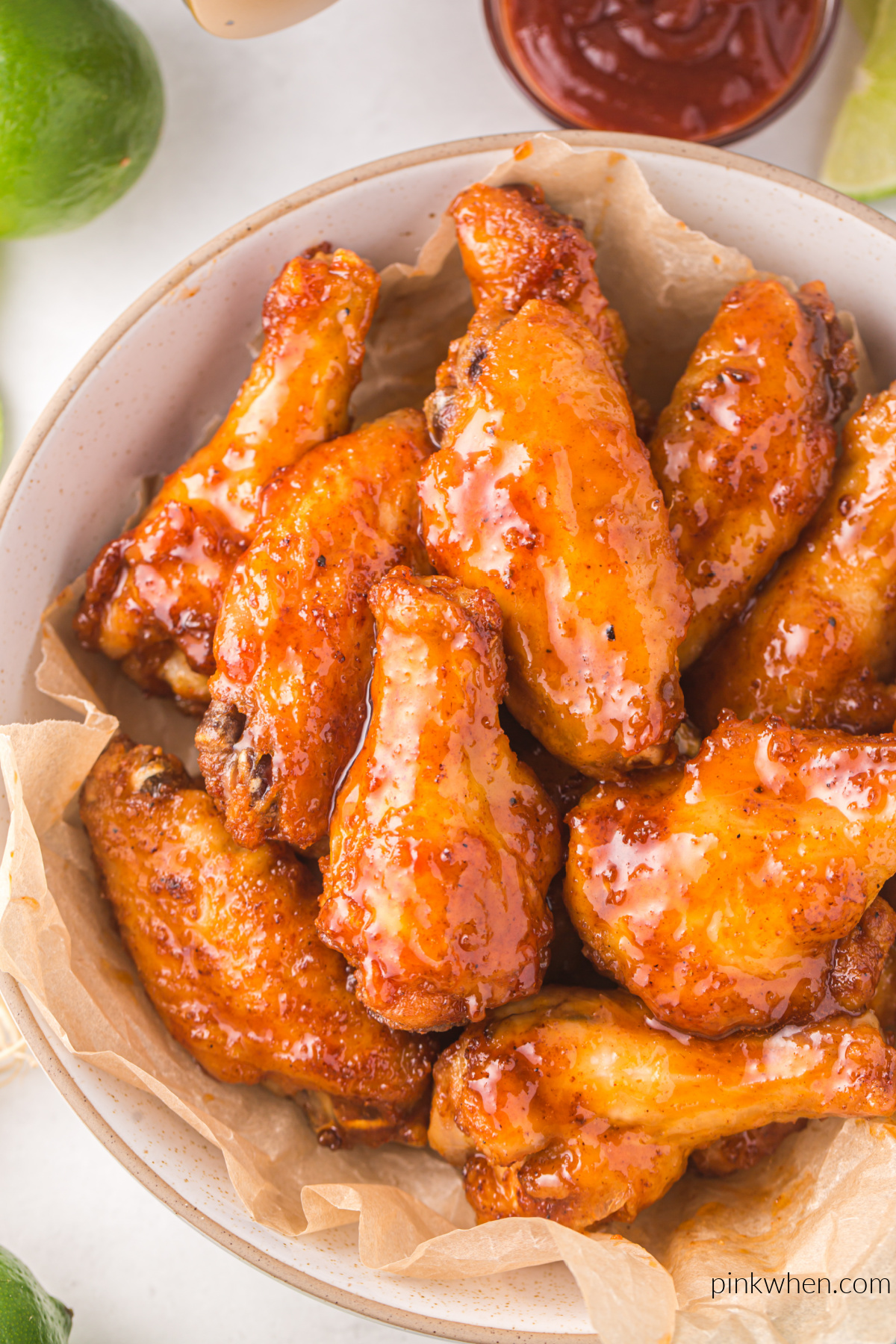 Overhead photo of honey sriracha wings in a bowl ready to serve.