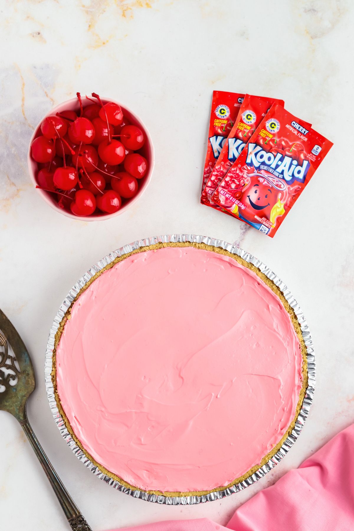 Cherry Kool-Aid Pie poured into a pie crust and then chilled.