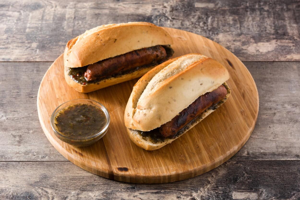 Argentina’s Choripan on a wooden board.