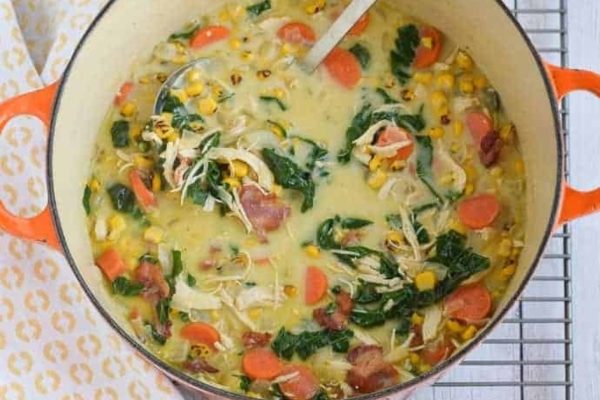 Creamy Chicken and Corn Soup with Bacon on a Dutch oven. 