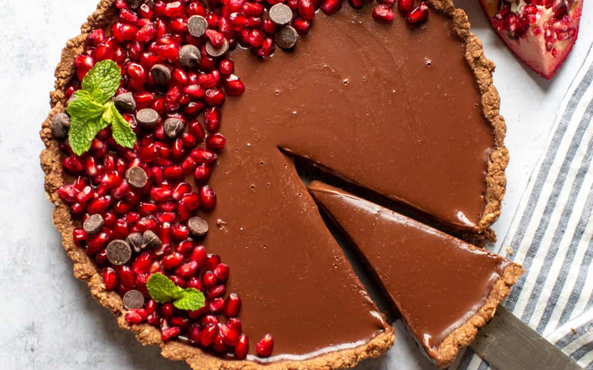 Close-up of chocolate tart with slice