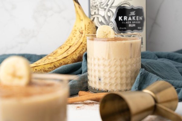 Spiked Bananas Foster Ice Cream Rum Nog Cocktail on a glass. 