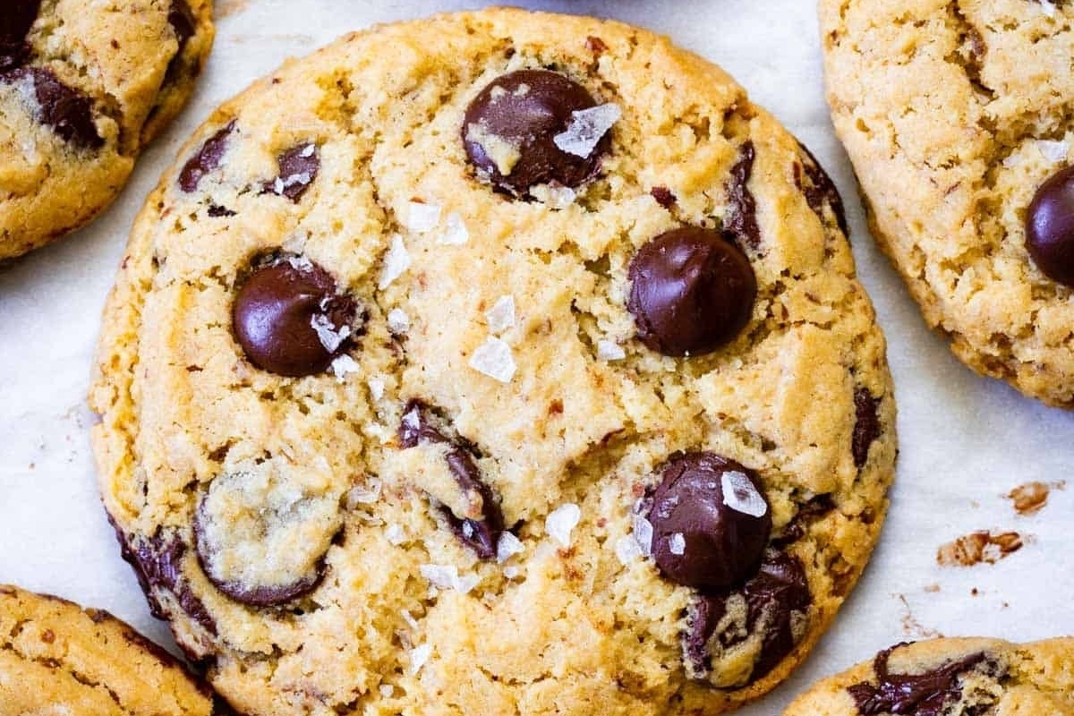 Chocolate chip cookies on a white serving plate.