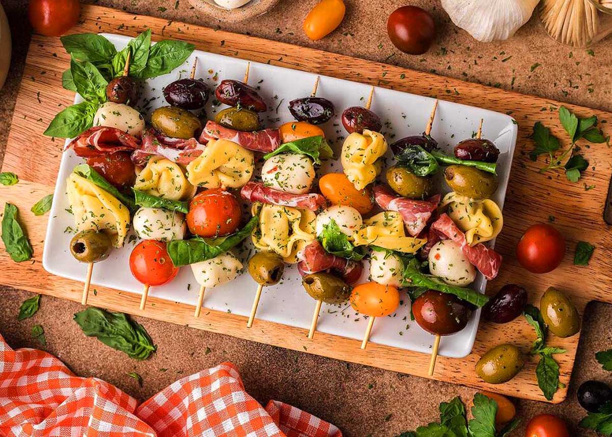 Antipasto Skewers on a white plate.