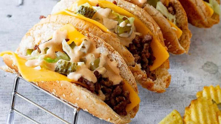 A stack of tacos on a rack.