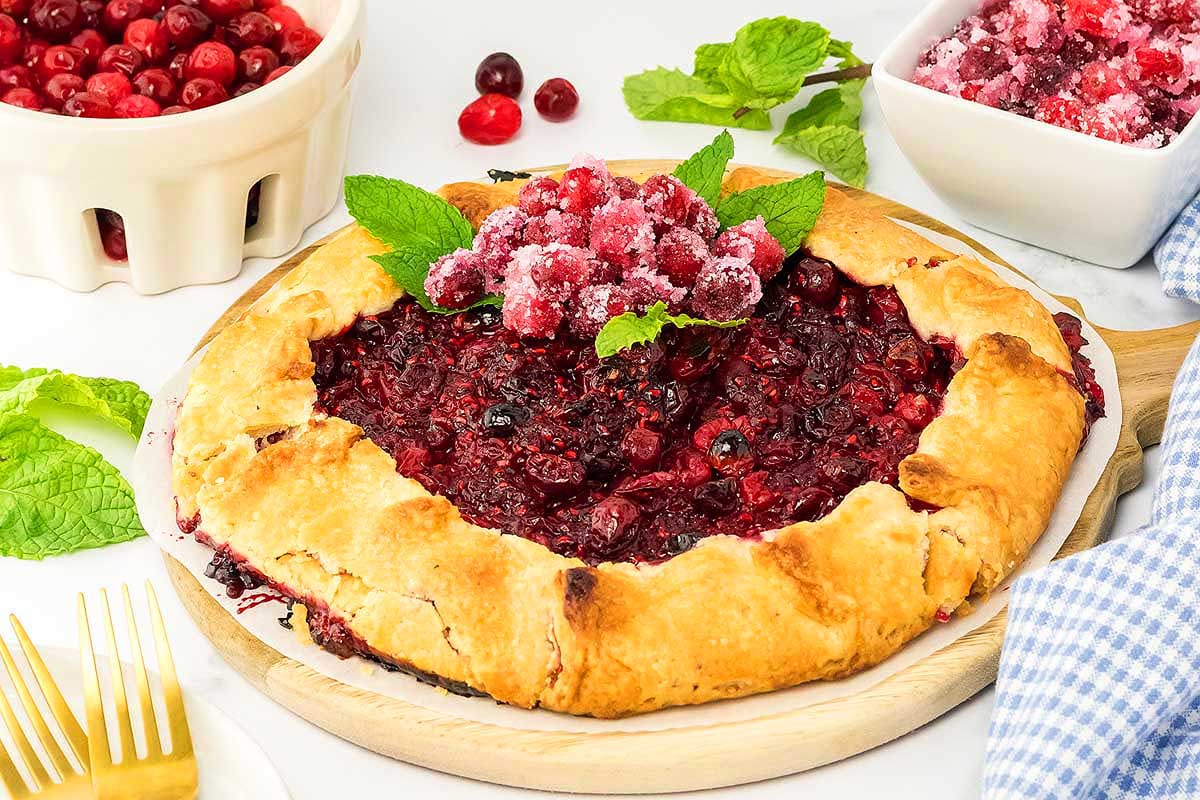 Cranberry galette on a wooden board.
