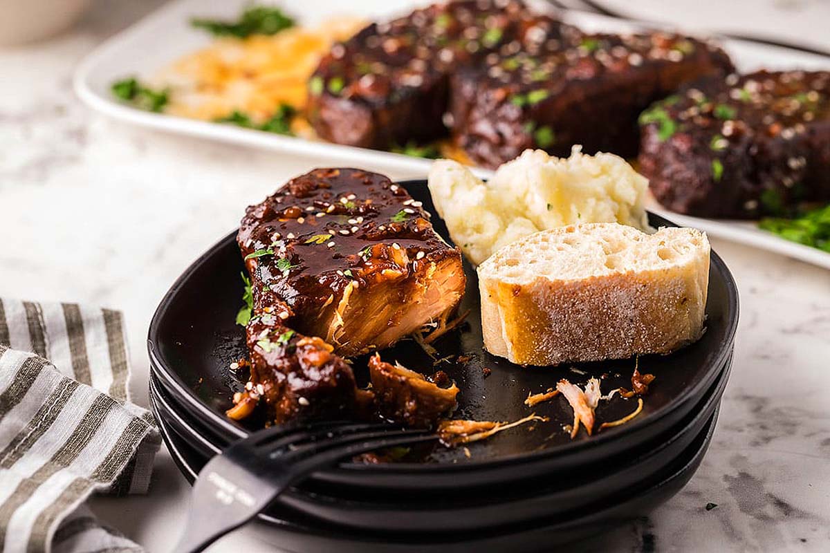 Honey pork chops served on a plate. These are the best pork chop recipes.