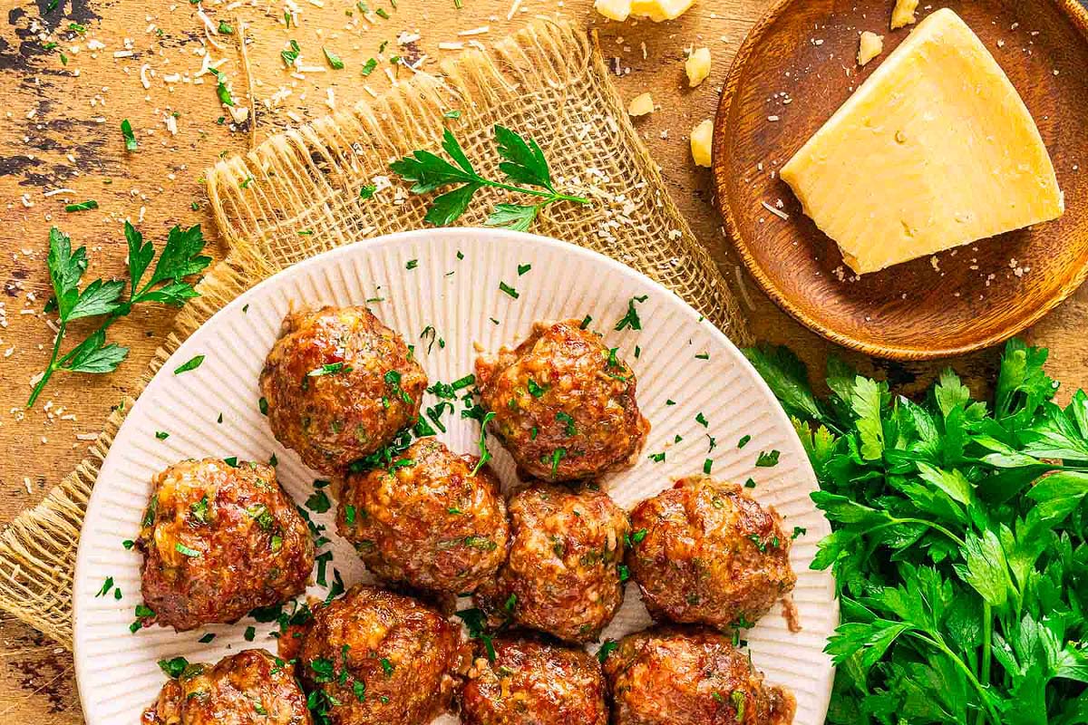 Smoked meatballs served on a plate.