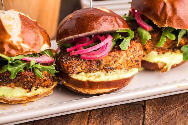 22 Salmon Dinners Your Family Will Love 6 A platter with salmon sliders on it.