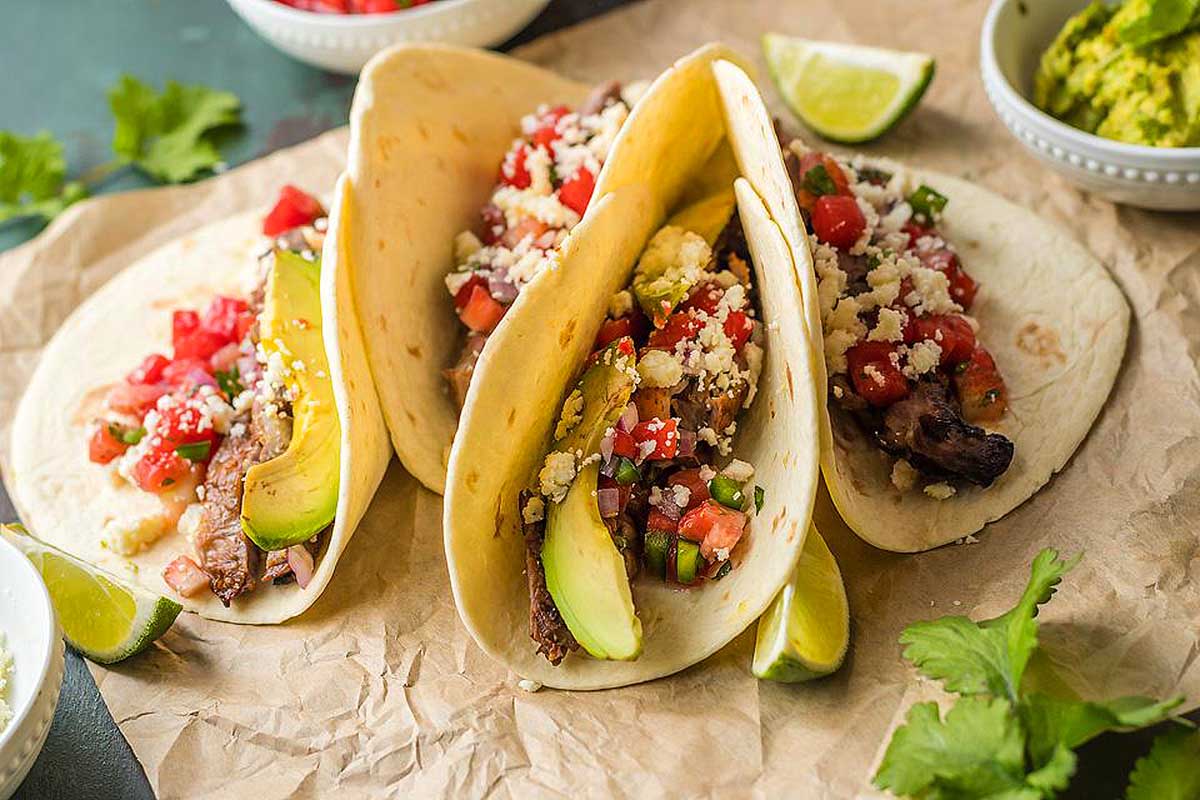 Mexican tacos with guacamole and salsa. This is one of the best taco recipes.