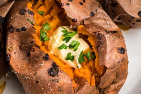 Creative Sweet Potato Recipes 8 Grilled sweet potatoes with butter and chives, a perfect side dish for turkey.