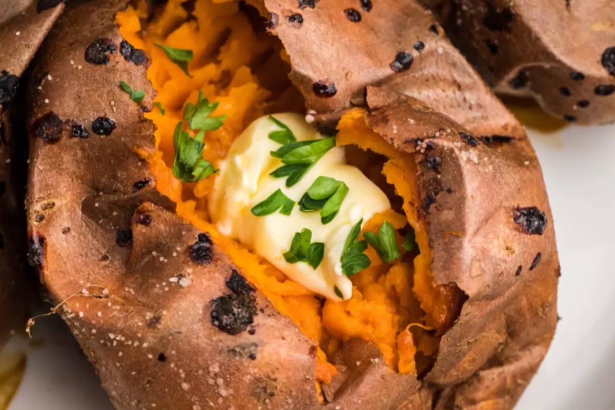 Grilled sweet potatoes with butter and chives, a perfect side dish for turkey.