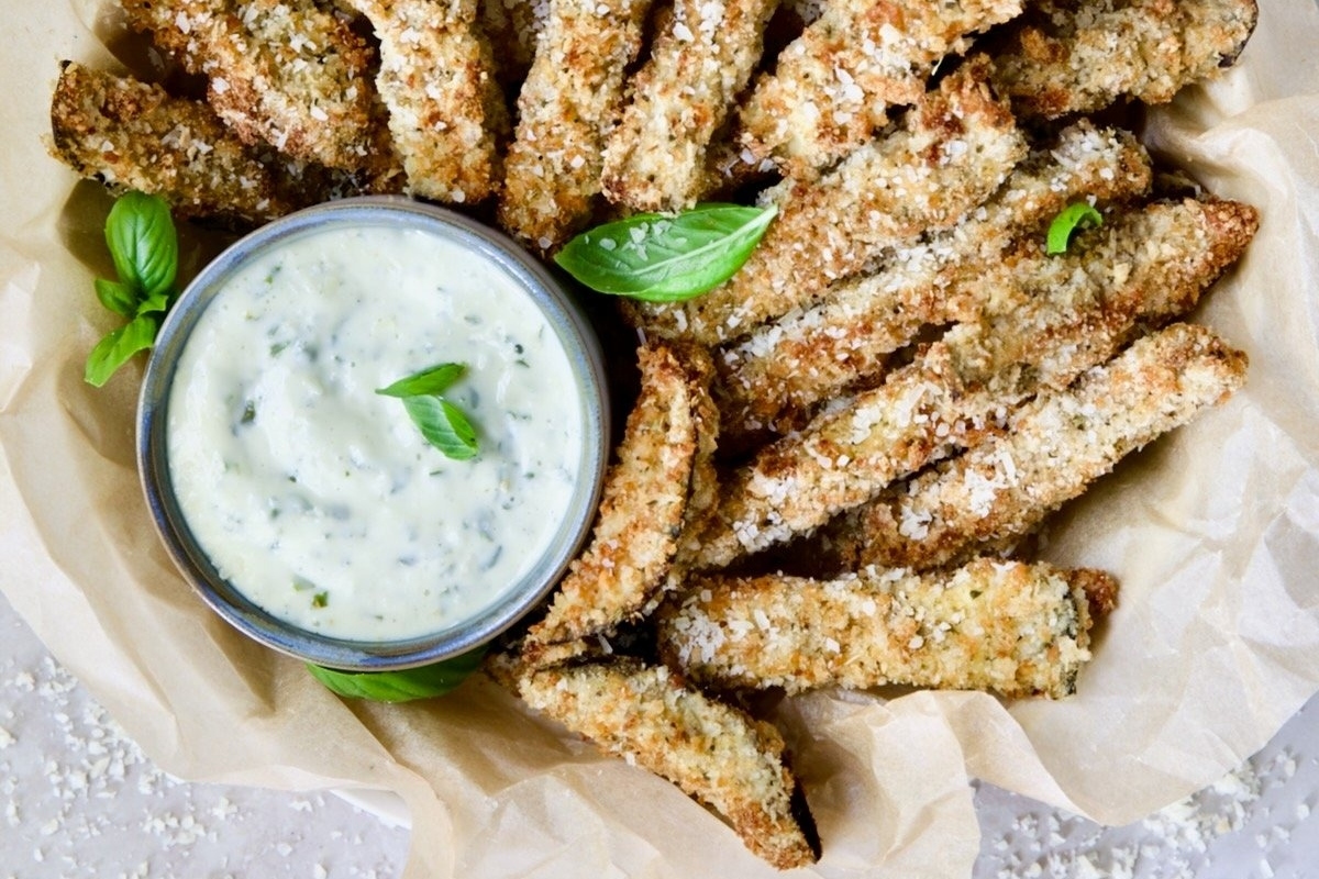 Fry Recipes: Enjoy crispy fried zucchini sticks served with a delectable dipping sauce.