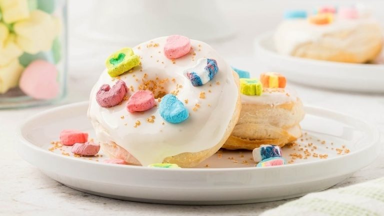 St patrick's day donuts on a white plate.