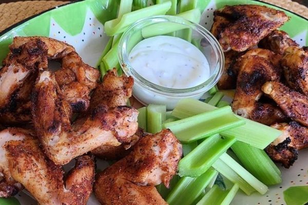 Game Day is the perfect time to indulge in delicious BBQ chicken wings. Served with celery and a mouthwatering dipping sauce, these wings are sure to be a hit.