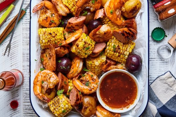 Shrimp and corn on a platter.