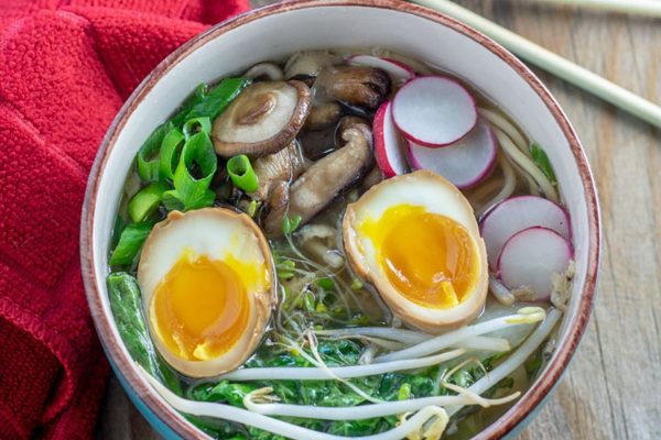 Ramen Recipes: A comforting bowl of ramen with eggs and radishes.