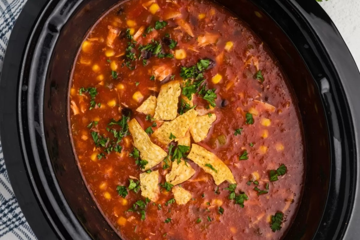 Mexican chicken soup made with a few ingredients in a crock pot.