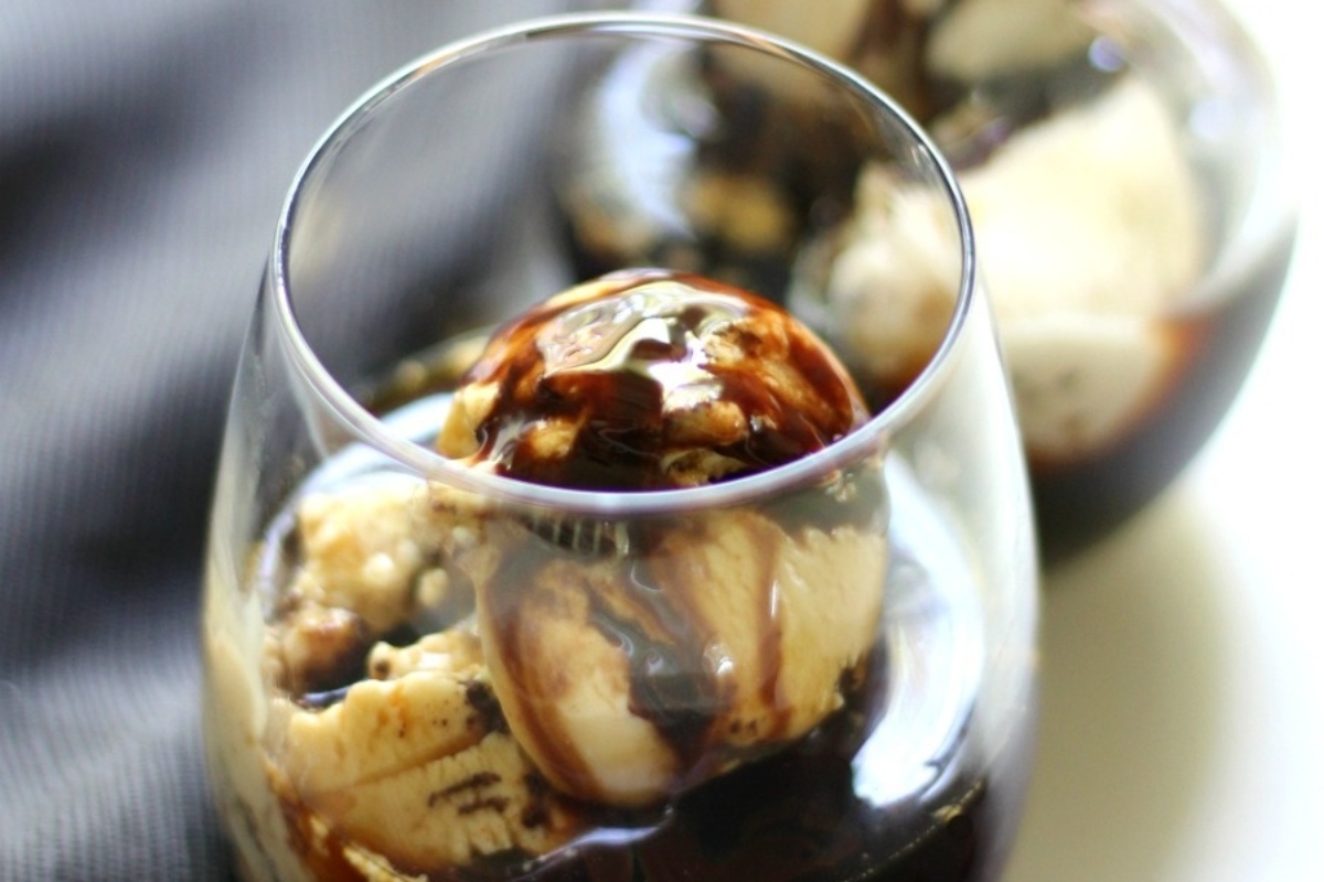 Italian dessert of ice cream in a glass with chocolate sauce.