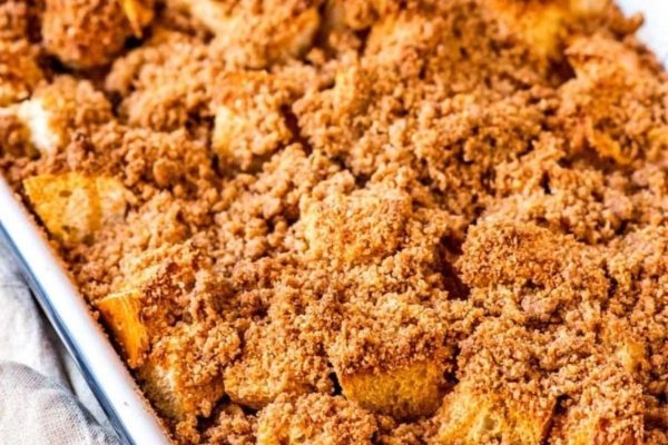 A dish with a crumb topping on it.