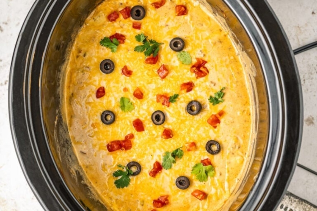 A slow cooker full of Mexican casserole.