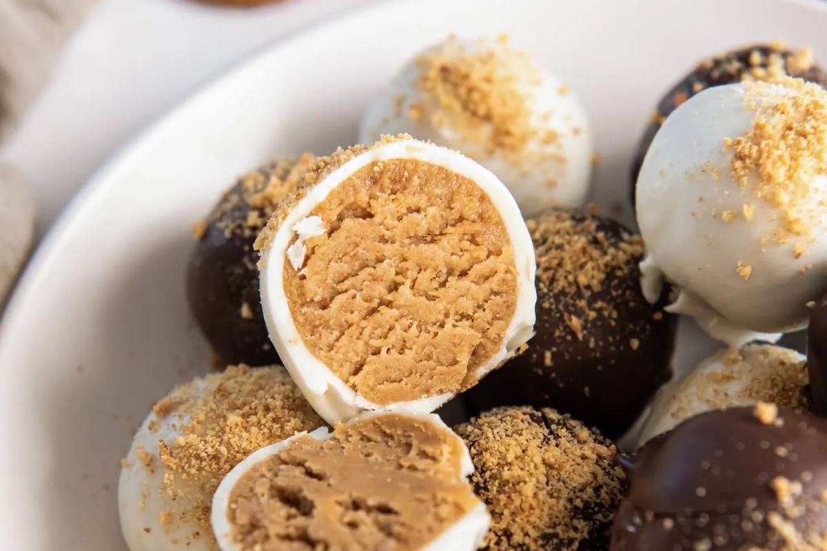 No Bake Peanut butter truffles on a white plate.
