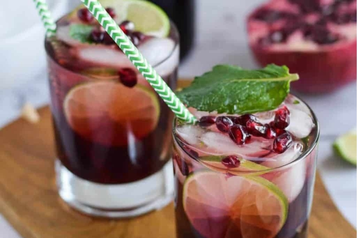 Christmas pomegranate margarita with lime, mint and pomegranate.